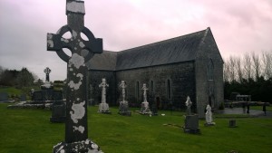Celtic cross cemetery marker in front of Ballintubber Abbey