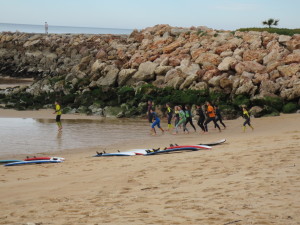 a surfing lesson on the Faro beach