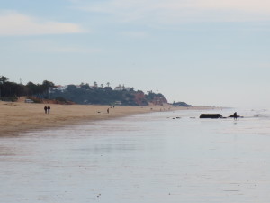 a view of the beach, extending for miles