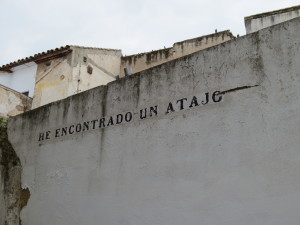 a wall that reads "I have found a shortcut"