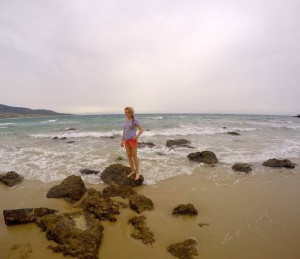 Standing on some rocks at playa de Bolonia
