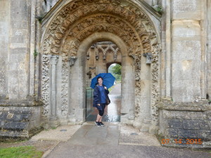 Standing at the ruins of Glastonbury Abbey