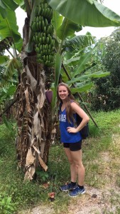 Standing next to a 100-year-old banana tree
