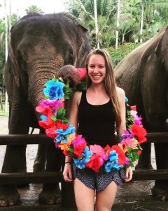 Pose with elephant and leis