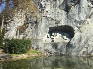 Sculpture in rock face of "Dying Lion of Lucerne"; symbolizing the loyalty and bravery of the French people 