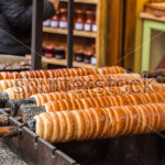 stock-photo-traditional-street-food-of-country-czech-republic-preparing-of-trdelnik-traditional-czech-bakery-384965218