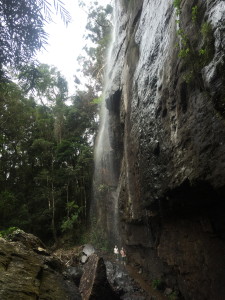 Walking behind the second waterfall