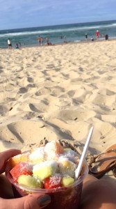 Enjoying an acai bowl on the beach